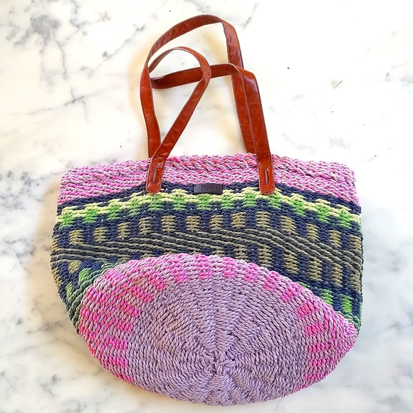 NWOT. Kbas Multi color design straw tote bag with lining and pockets. - Picture 4 of 5